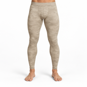 Les leggings de compression pour hommes offrent un ajustement de soutien, un confort extensible et une mobilité flexible pour l'entraînement physique et les activités sportives. - Product Image 1
