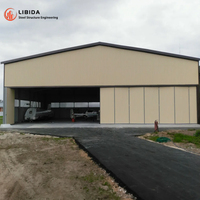 Hangar d'avion préfabriqué en structure métallique à grande portée, conception personnalisée, bâtiment de stockage d'avions