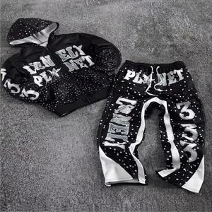 Conjunto de chándal de peso pesado y talla grande con sudadera con capucha con cremallera, efecto salpicado y pedrería brillante, y pantalones de chándal de doble cintura - Product Image 1