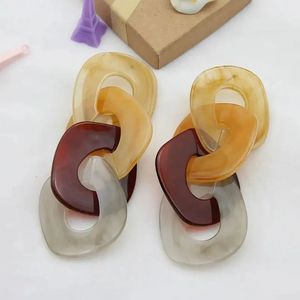 Boucles d'oreilles pendantes en résine de style européen et américain, motif fleur éternelle - Product Image 2