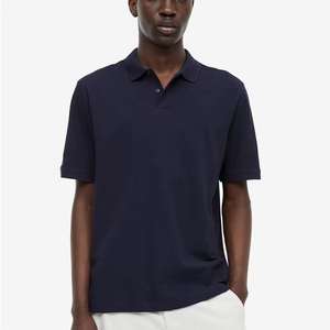 เสื้อโปโลแขนสั้นผู้ชาย ทรงเข้ารูป คอกลม ตัดเย็บด้วยผ้าฝ้ายลายทางตัดสี - Product Image 1