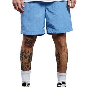 Shorts de sport pour homme en polyester uni, taille mi-haute, avec cordon de serrage, décontractés, séchage rapide - Product Image 2