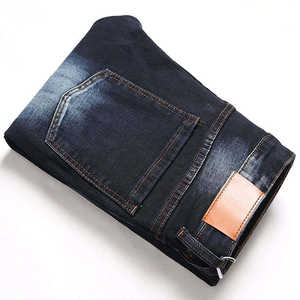 กางเกงยีนส์ผู้ชายทรงสลิมฟิตแบบใหม่จากโรงงาน ล้างสีแล้ว แต่งขาดๆ แบบดิสเทรส - Product Image 2