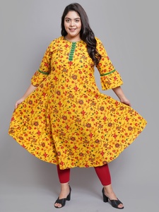 Mustard Cotton Anarkali <b>Kurti</b> With Floral Print Bell Sleeves And Round Neck Design For Plus Size Women's Collection - Product Image 1