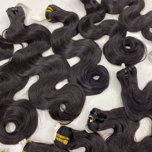 Extensiones de cabello humano vietnamita ondulado de cuerpo negro natural de alta calidad al por mayor 100% extremos doblemente dibujados para tejer - Product Image 4