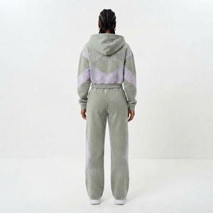 Conjunto deportivo informal de dos piezas para mujer, con sudadera corta con cremallera y bloques de color, y pantalones deportivos de pierna ancha. - Product Image 2