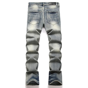 Pantalones vaqueros de mezclilla ajustados con efecto desgastado, cintura media, cinco bolsillos, largo completo, de algodón, para hombre, estilo casual, con efecto lavado a la piedra y bordes deshilachados - Product Image 1