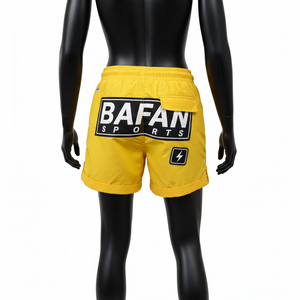 กางเกงขาสั้นวินด์เบรกเกอร์สำหรับผู้หญิง ผ้าไนลอนพรีเมียม สีเหลืองล้วน สไตล์สตรีท พร้อมโลโก้ปะยาง ป้าย PVC - Product Image 2