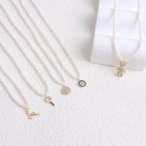 Collier pendentif de mode de conception rétro coréenne Wenchi, visage souriant, étoile, perle, œil du diable, chaîne de clavicule, collier haut de gamme, modèle - Product Image 1