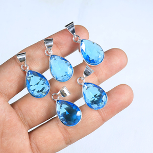 Pendentif en cristal bleu facetté de haute qualité, forme goutte d'eau, monture argentée, tendance, vente en gros, fournitures de bijoux de boutique, meilleures ventes - Product Image 1