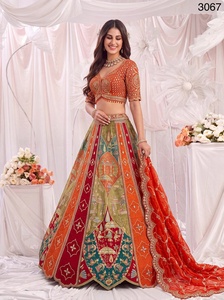 Ensemble de fête prêt-à-porter en soie Gadhwal de luxe, comprenant un Lehenga Choli orange de créateur, un imprimé de qualité supérieure et un travail de miroir et de Dori, avec chemisier cousu. - Product Image 2