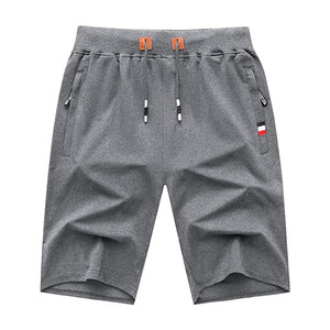 Shorts décontractés pour hommes, coupe ajustée, légers, en polyester/coton, pour l'été, fermeture à boutons, logo personnalisé, couleur unie, écologiques, fabriqués en usine - Product Image 3