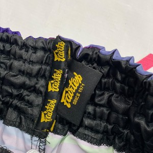 Pantalones Cortos de Muay Thai Fairtex de Último Diseño en Naranja y Negro con Logotipo Bordado y Estampado por Sublimación - Product Image 5