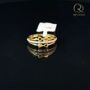 Stylish <b>gold</b> <b>ring</b> with bow design and diamond accent elegant jewelry for women daily wear gift modern trendy look - Product Image 1