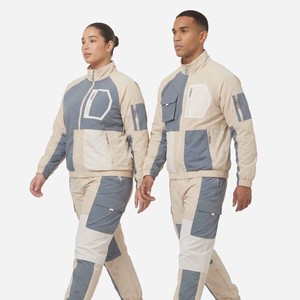 Ensemble de survêtement unisexe personnalisé avec poche coupe-vent, veste zippée imperméable en polyester, survêtement de luxe en nylon de haute qualité - Product Image 2