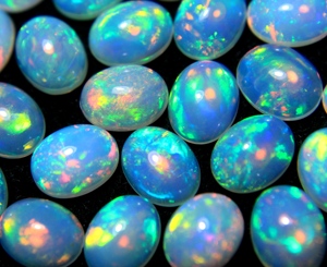 โอปอลเอธิโอเปียหลากสี โอปอลธรรมชาติ รูปทรงวงรี คาโบชอง สีไฟหลากหลาย เวโลโอปอล สำหรับทำเครื่องประดับ HASNAIN GEM - Product Image 6