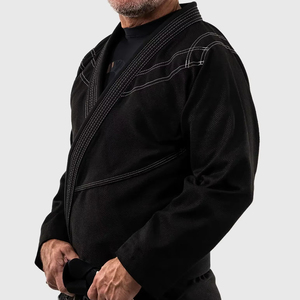 ชุดฝึกซ้อม 100% ผ้าฝ้ายยืดหยุ่น น้ำหนักเบา ระบายอากาศได้ดี สำหรับทุกเพศ  รับสั่งทำโลโก้แบบพิมพ์ร้อน สำหรับกีฬายิวยิตสู - Product Image 1