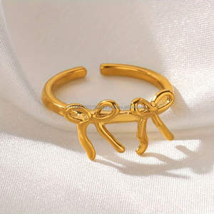 Anneaux de serviette en aluminium écologiques au design nœud doré personnalisé, style minimaliste, élégants et fabriqués à la main en Inde pour mariages et hôtels - Product Image 3