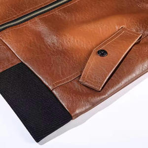 Shop our Men's Brown Faux <b>Leather</b> Tactical Bomber <b>Jacket</b>. Durable, stylish, and utility-driven with multiple reinforced pockets. - Product Image 5