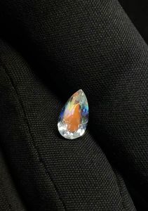 Piedra lunar arcoíris natural tallada en forma de pera. Piedra lunar arcoíris multicolor tallada en forma de pera. - Product Image 3