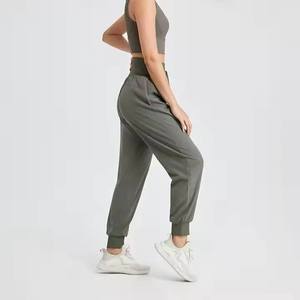 Pantalones de cintura alta, holgados, de color liso, con cordón, hasta el tobillo, estilo informal, estilo otoñal - Product Image 2