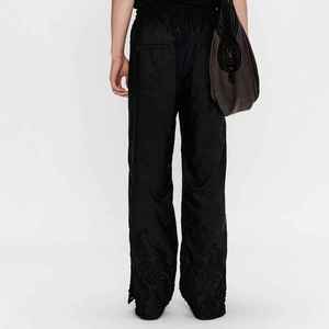Pantalon homme noir en soie brodé, taille élastique avec cordon de serrage, style chinois, infroissable, poids moyen, pour l'automne - Product Image 4