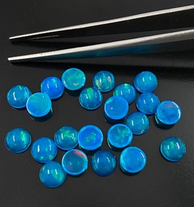 พลอยโอปอลสีน้ำเงินทรงกลมเจียระไนแบบบริลเลียนท์  ธรรมชาติ  มีการเปลี่ยนสี  สำหรับทำเครื่องประดับ  ขัดเงาแล้ว  จากราชสถาน - Product Image 5