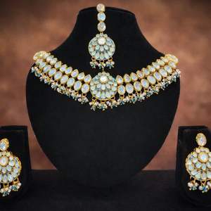 Ensemble de bijoux de mariage traditionnel en cuivre Kundan avec collier ethnique et boucles d'oreilles assorties pour femmes - Product Image 1