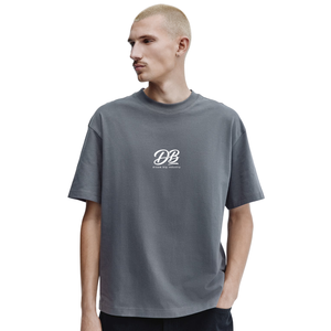 เสื้อยืดคอตตอนหนานุ่มทรงหลวมสำหรับผู้ชาย เสื้อยืดคอกลมลำลองสไตล์สตรีทแวร์ รับผลิตเสื้อผ้าแบบ OEM ODM จากโรงงานโดยตรง - Product Image 1