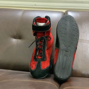 Bottes moto noires à lacets en cuir véritable avec semelle extérieure en caoutchouc respirante, doublure Nomex, fermeture auto-agrippante, bout fermé, antidérapantes en EVA - Product Image 1