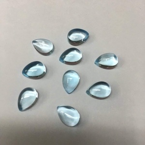 พลอยโทแพซสีฟ้าธรรมชาติทรงลูกแพร์แบบคาโบชองขายส่ง สำหรับผู้จัดจำหน่ายที่ได้รับการรับรอง ใช้เป็นพลอยประจำเดือนเกิด เหมาะสำหรับทำเครื่องประดับ - Product Image 5