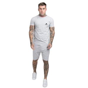 Conjunto de camisetas y pantalones cortos de algodón para hombre de talla grande al por mayor, ropa de dos piezas de moda sólida de verano con logotipo personalizado - Product Image 1