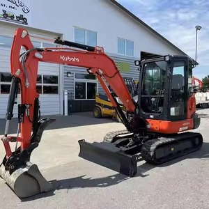 Excavadora Compacta Usada de Color Amarillo con Orugas de Goma Reforzadas y Brazo Giratorio Lateral para Trabajos de Paisajismo Residencial y Utilidades - Product Image 5
