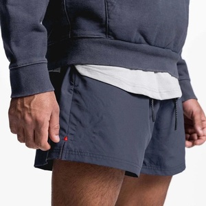 Shorts de sport modernes en toile solide, respirants et à séchage rapide, confortables, en polyester/nylon, coupe ample pour la course et l'entraînement. - Product Image 6