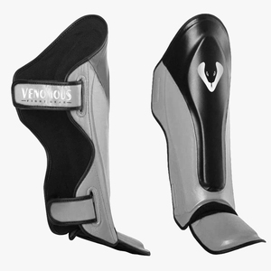 Protège-tibias Venomous Fight Gear en cuir PU noir et gris, ajustables avec fermeture auto-agrippante, protection légère pour adultes - Product Image 1