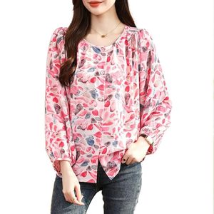 Blusa Elegante para Mujer con Estampado Floral y Mangas Largas Abullonadas para un Toque Moderno - Product Image 1