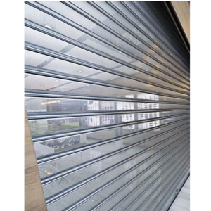 Fabricante de Persianas Enrollables Transparentes de Policarbonato Automáticas de Primera Calidad para Tiendas Minoristas con Sistema de Puerta de Seguridad Duradero - Product Image 4