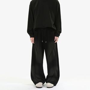 กางเกงวอร์มขาบานทรงหลวมสไตล์วินเทจสำหรับผู้ชายและผู้หญิง ผ้าฟลีซฟอกสีแบบ OEM สั่งทำพิเศษ แต่งแถบข้าง ทรงโอเวอร์ไซส์ ผ้าฝ้าย 100% - Product Image 3