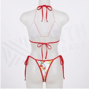 Floral Print 2 Piece Bikini Set With Red Contrast Binding <b>Crossed</b> Halter <b>Top</b> And Tie Side Bottoms Women's Swimwear - Product Image 2