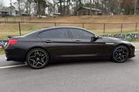 BMW Alpina B6 Gran Coupé 2017 d'occasion, 600 ch, V8 biturbo, transmission intégrale, pack Executive, noir rubis métallisé