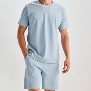 Conjunto de camiseta y pantalones cortos de algodón azul claro para hombre, cuello redondo, transpirable, informal, de verano, de dos piezas - Product Image 4