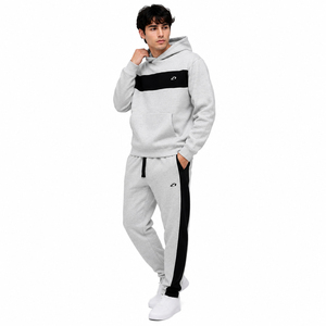 Survêtement homme bicolore gris chiné en molleton de coton épais, deux pièces : sweat à capuche et pantalon de jogging fuselé, logo frontal, hiver - Product Image 1