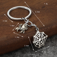 Llavero de aleación con diseño de telaraña calada y cadena para decoración de mochila de Halloween