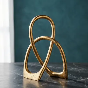 Sculpture abstraite en métal en forme de boucle, pièce d'art décorative, figurine moderne pour table, décoration pour la maison, le bureau ou le salon - Product Image 4