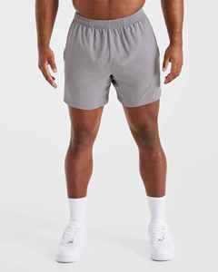 Shorts pour hommes gris uni à séchage rapide avec taille élastique, coupe mi-haute, décontractés, tissés, personnalisables, avec logo sur mesure, OEM - Product Image 4