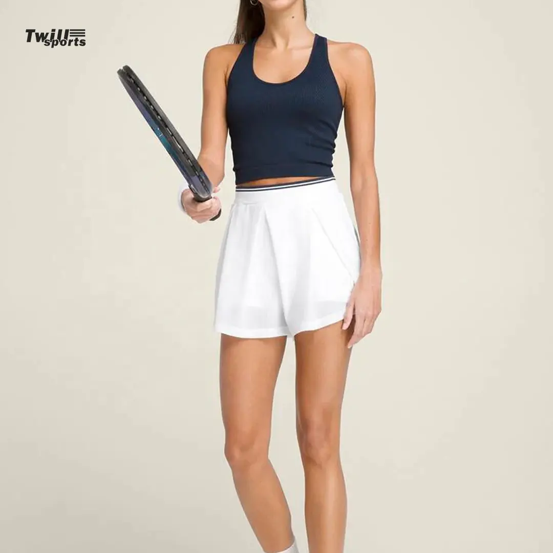 Logo personnalisé Fabricants de vêtements de tennis Vêtements de sport pour femmes Jupes de tennis athlétiques dorées pour écolières