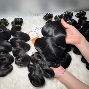 Vendeur de cheveux en gros Extensions de cheveux ondulés pour le corps 100% Paquets de cheveux vietnamiens bruts Prix bon marché Longue durée - Product Image 4