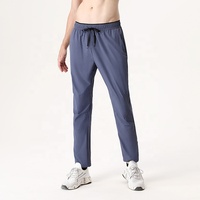 Haute qualité 90% Nylon 10% Spandex séchage rapide extensible résistant à l'eau athlétique actif course entraînement Gym survêtement pantalon pour hommes
