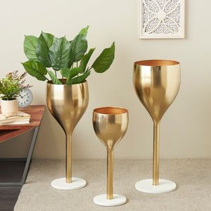 Artistic Traditional Decorative Metal Planter with Hand Carved Details for Stylish Flower Displays and Home Decor - Product Image 1