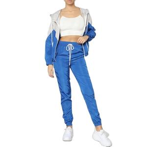 Ensemble survêtement coupe-vent streetwear pour femme avec logo personnalisé, léger, fermeture éclair intégrale, 100 % nylon, faible MOQ, ensemble 2 pièces - Product Image 1